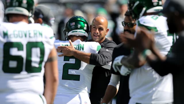 Jets' QB Zach Wilson and head coach Robert Saleh embrace